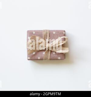 Pink dot pattern gift box isolated on white background. top view, copy space Stock Photo