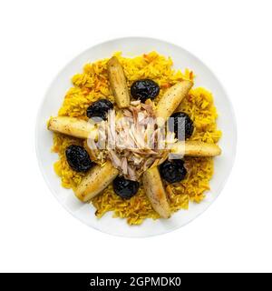 Traditional oriental pilaf with meat in a plate on a white background.  Top view. Isolated Stock Photo