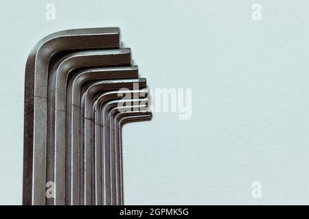 Set of metal hex keys close-up on a white background.  Stock Photo