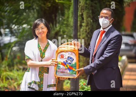 Addis Ababa, Ethiopia. 29th Sep, 2021. Ethiopian Minister of Education Getahun Mekuria (R) and Country Director of China Foundation for Poverty Alleviation (CFPA) Ethiopia Office Huang Xiaocen pose for photos at the donation ceremony of 20,000 school bags donated by CFPA in Addis Ababa, capital of Ethiopia, Sept. 29, 2021. TO GO WITH 'Roundup: Chinese organization donates school bags to Ethiopian students in need' Credit: Michael Tewelde/Xinhua/Alamy Live News Stock Photo
