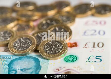 Undated file photo of money. The UK's economic bounce-back was faster than first thought in the second quarter as spending surged after lockdowns lifted, according to official figures. The Office for National Statistics (ONS) said gross domestic product (GDP) increased by 5.5% between April and June after being revised up from the initial estimation of 4.8%. Issue date: Thursday September 30, 2021. Stock Photo