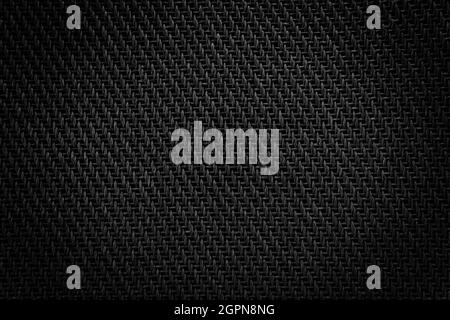 Mesh cloth speaker black fabric detail of the amplifier. Stock Photo