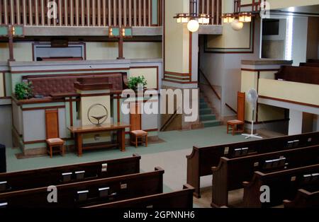 Frank Lloyd Wright (1867-1959). American architect and interior designer. Unity Temple, 1905-1907. Headquarters of the Unitarian Universalist Church. Partial view of the interior of the sanctuary. Oak Park. Near Chicago. State of Illinois. United States. Stock Photo