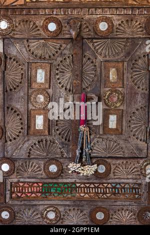 Beaded tassel on carved wooden cabinet in Spanish villa, Mallorca Stock Photo