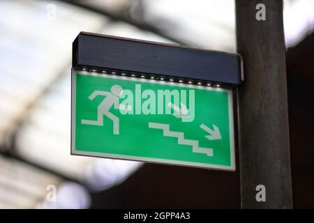 Emergency exit sign on street Stock Photo