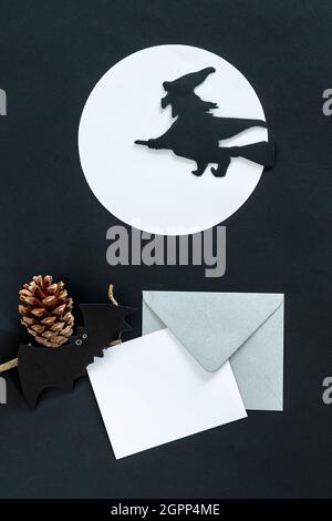 Vertical shot of a black Halloween background with different 3d rendered Halloween decorations Stock Photo