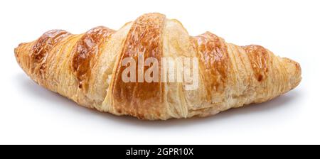 Tasty crusty croissant close-up on a white background. Stock Photo