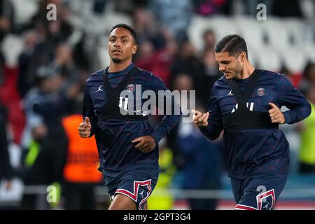 Paris, France. 28th Sep, 2021. Abdou Diallo (left) & Mauro Icardi of PSG post match during the UEFA Champions League match between Paris Saint Germain and Manchester City at Le Parc des Princes, Paris, France on 28 September 2021. Photo by Andy Rowland. Credit: PRiME Media Images/Alamy Live News Stock Photo