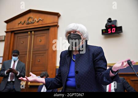 Washington, DC, USA. 30th Sep, 2021. Janet Yellen, U.S. Treasury secretary, gestures while arriving to a House Financial Services Committee hearing in Washington, DC, U.S., on Thursday, Sept. 30, 2021. The Treasury secretary this week warned in a letter to congressional leaders that her department will effectively run out of cash around Oct. 18 unless Congress suspends or increases the debt limit. Credit: Al Drago/Pool via CNP/dpa/Alamy Live News Stock Photo