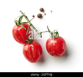 Grilled cherry tomatoes isolated on white background, top view Stock Photo