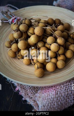 Fresh Longan Or Mata Kucing On A Wooden Plate Selected Focus Stock Photo Alamy