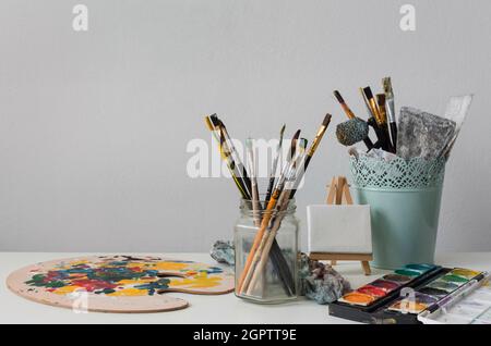 Artist props collection on table Stock Photo