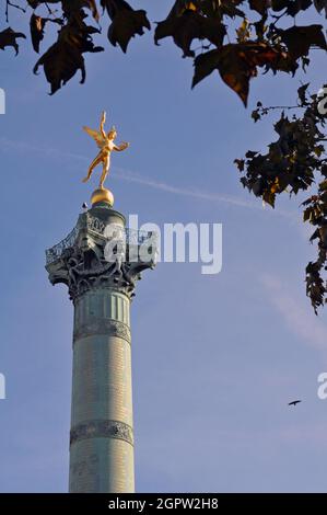 The Colonne de Juillet (July Column) in Paris' Place de la Bastille is topped by Auguste Dumont's sculpture Génie de la Liberté (Spirit of Freedom). Stock Photo