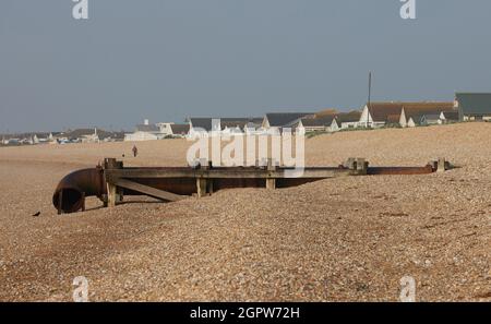 Large rusty water outlet seen on the beach of Aldham, UK in summer 2021. Stock Photo