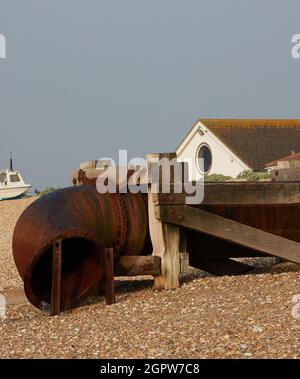 Large rusty water outlet seen on the beach of Aldham, UK in summer 2021. Stock Photo