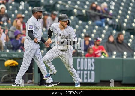 Denver CO, USA. 29th Sep, 2021. Colorado shortstop Trevor Story (27) rounds third during the game with Washington Nationals and Colorado Rockies held at Coors Field in Denver Co. David Seelig/Cal Sport Medi. Credit: csm/Alamy Live News Stock Photo