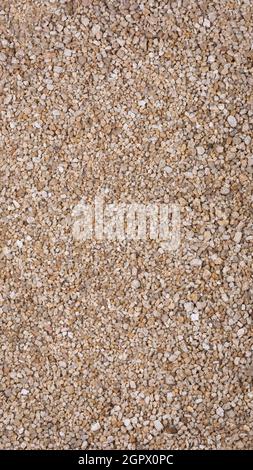 small stones, gravel rocks surface background texture, wallpaper backdrop Stock Photo