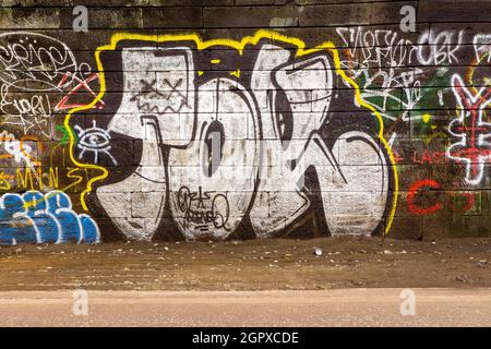 Graffiti art work in the Innocent Railway Tunnel in Edinburgh, Scotland, UK Stock Photo