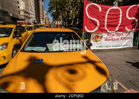 Taxicabs parked at a protest by their owners calling for debt relief, at City Hall in New York on Friday, September 24, 2021. The owners of the medallions are suffering from the inflated prices paid from a speculative bubble just a e-hail livery flooded the market.  (© Richard B. Levine) Stock Photo