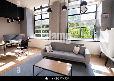 Work From Home Desk With Desktop Computer In Modern Home Stock Photo