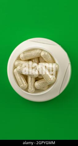 white medical pills close-up. dietary supplements top view. wellbeing and personal health care concept Stock Photo
