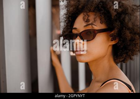 A headshot of a cute dark-skinned woman Stock Photo