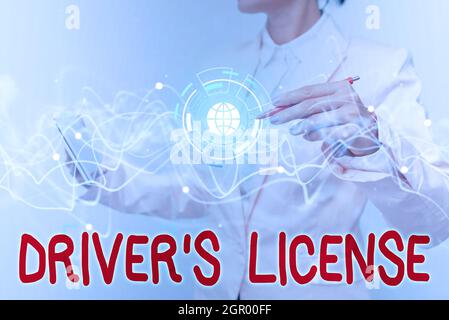 Handwriting text Driver S License. Concept meaning a document permitting a person to drive a motor vehicle Lady In Uniform Using Futuristic Mobile Stock Photo