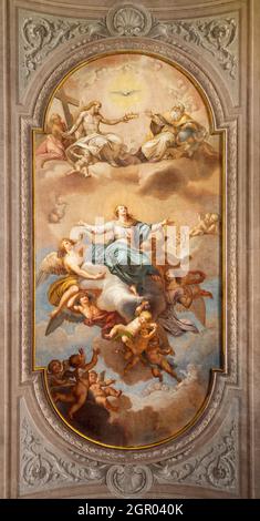 ROME, ITALY - AUGUST 31, 2021: The ceiling fresco of Coronation of Virgin Mary in the church Santa Maria della Concezione dei Cappuccini Stock Photo