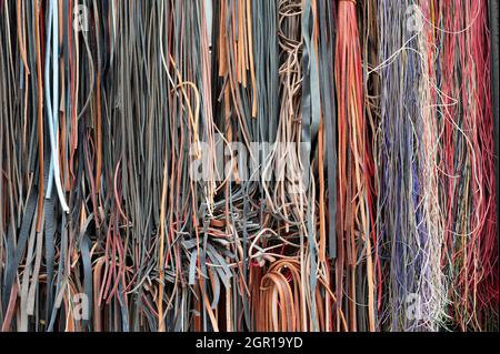 Electrical cables on worn old wall Stock Photo