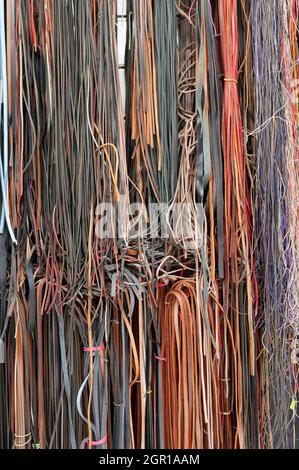 Electrical cables on worn old wall Stock Photo