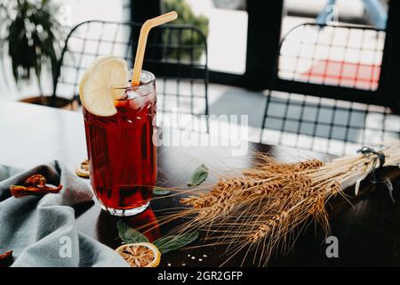 Delicious glass of cold drink cocktail with lemon on the desk Stock Photo