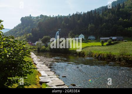 Beautiful landscape of small river and the waterfall in Odda town, Vestland county, Norway Stock Photo