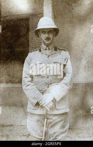 A British army staff officer outside the Headquaters of the General Officer Commanding (GOC) 11th Northern Division stationed in Ismailia along the Suez Canal, Egypt. December 1915. The infantry division heavily involved in the Gallipoli Campaign and was evacuated in Decemeber 1915 to Eygpt, where it was stationed to guard the Suez Canal. Stock Photo