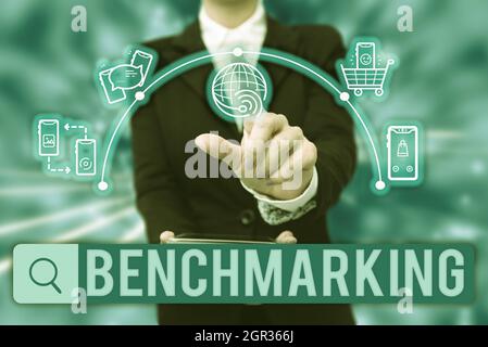 Conceptual display Benchmarking. Business approach evaluate something by comparison with standard or scores Lady In Uniform Holding Tablet In Hand Stock Photo