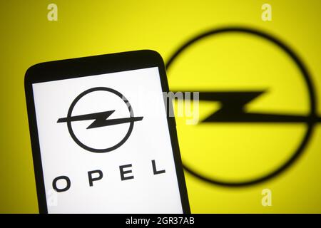 Ukraine. 30th Sep, 2021. In this photo illustration an Opel logo is seen on a smartphone and a pc screen. Credit: SOPA Images Limited/Alamy Live News Stock Photo