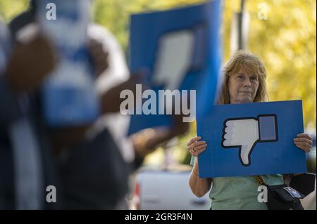 Washington, United States. 30th Sep, 2021. A woman holds a 'thumbs down' sign during a Free Action Press rally demanding Facebook ban 'Team Trump' advertisements in accordance with their June decision to bar former President Donald Trump outside the US Capitol on Thursday, September 30, 2021. Photo by Bonnie Cash/UPI Credit: UPI/Alamy Live News Stock Photo