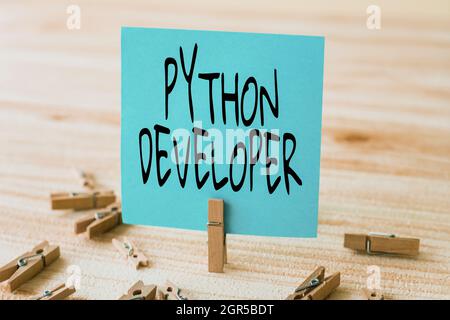 Text sign showing Python Developer. Concept meaning responsible for writing serverside web application logic Piece Of Blank Square Note Surrounded By Stock Photo