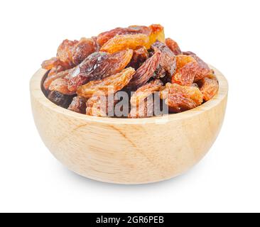 Golden dried raisins in wooden bowl isolated on white background, Save clipping path. Stock Photo