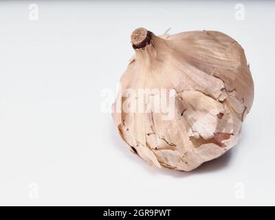 Black garlic isolated on white background Stock Photo