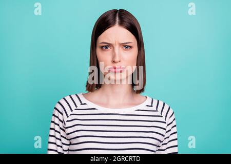 Photo of grumpy offended lady pout lips look camera wear striped shirt isolated on turquoise background Stock Photo