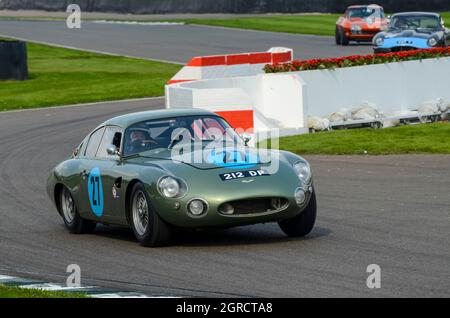 1961 Aston Martin Project 212 classic, vintage race car, racing in the RAC Tourist Trophy at the Goodwood Revival 2014 powering out from the chicane Stock Photo