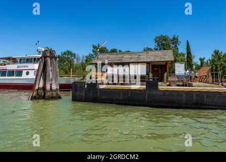 TORCELLO, ITALY - JUNE 2, 2021: Torcello island ferry boat station, Vaporetto Actv (municipal company for public transport), Venetian lagoon, Venice, Stock Photo