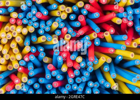 Cross section of copper electrical installation cable cord as background Stock Photo
