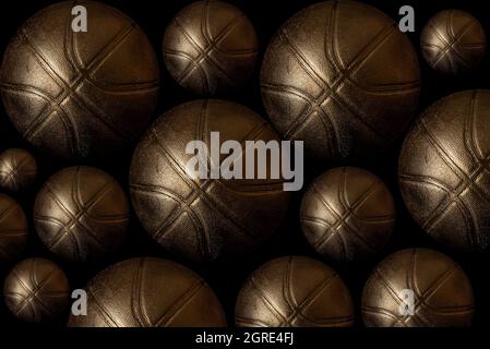 Gold and black basketball ball isolated on white background. 3d