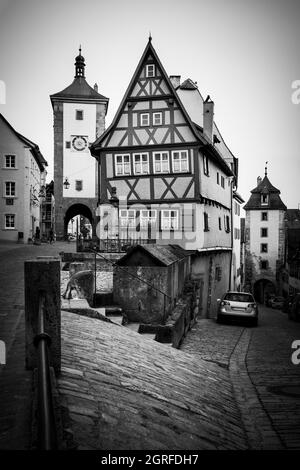 Old street in Rothenburg ob der Tauber, Germany.  Black and white photography Stock Photo