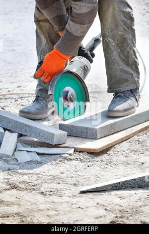grinder and a diamond cutting disc 