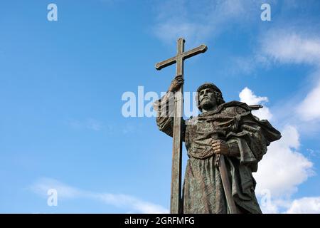 Moscow, Russia september 6, 2021a bronze monument to Prince Vladimir with a Christian cross in the historical center of the capital over blue sky back Stock Photo