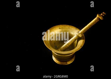 September 2021.Close up of a copper mortar on black background. High quality photo Stock Photo