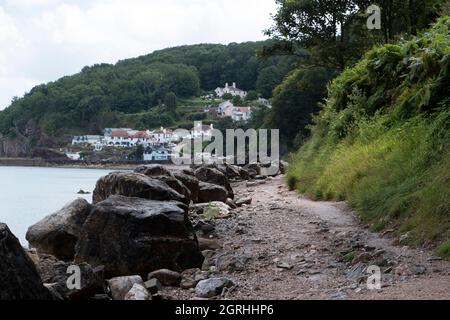A footpath leading away from Oddicombe beach in Babbacombe, Torquay, England Stock Photo