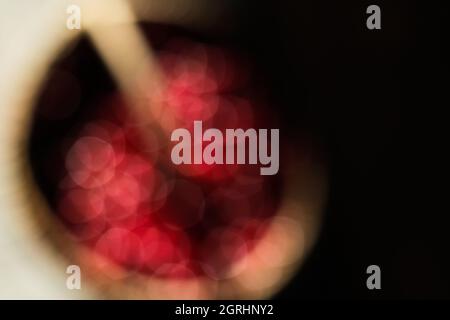 Defocus abstract red brown cream christmas background. dark bright bokeh abstract light background. Backdrop blur glitter light. Valentines day. Holid Stock Photo